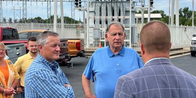 Westerman and Boozman listen to Powerhouse employee