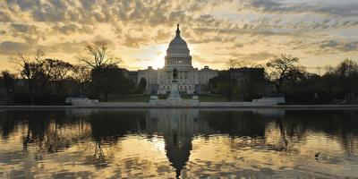 US Capitol Building with sunrise sky