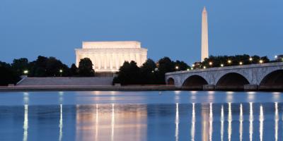 Monuments and Potomac River at night